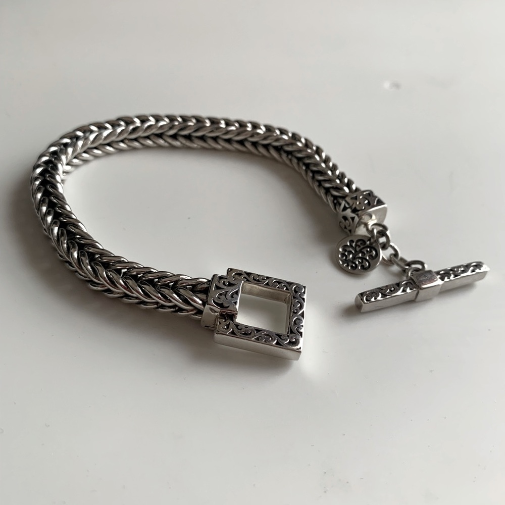 Designer “Lois hill” handwoven chain bracelets with hand carved scroll toggle